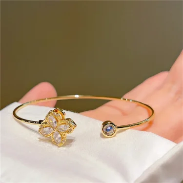 Luxury Rotable Zircon Four Leaf Grass Gold Color Copper Open Bracelets for Women New Fashion Advanced Wedding Party Jewelry Gift 4