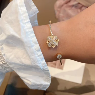 Luxury Rotable Zircon Four Leaf Grass Gold Color Copper Open Bracelets for Women New Fashion Advanced Wedding Party Jewelry Gift 3