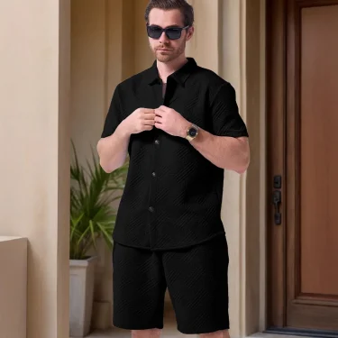 A two-piece set of solid jacquard short-sleeved cardigan paired with casual drawstring shorts for the summer of 2025 1