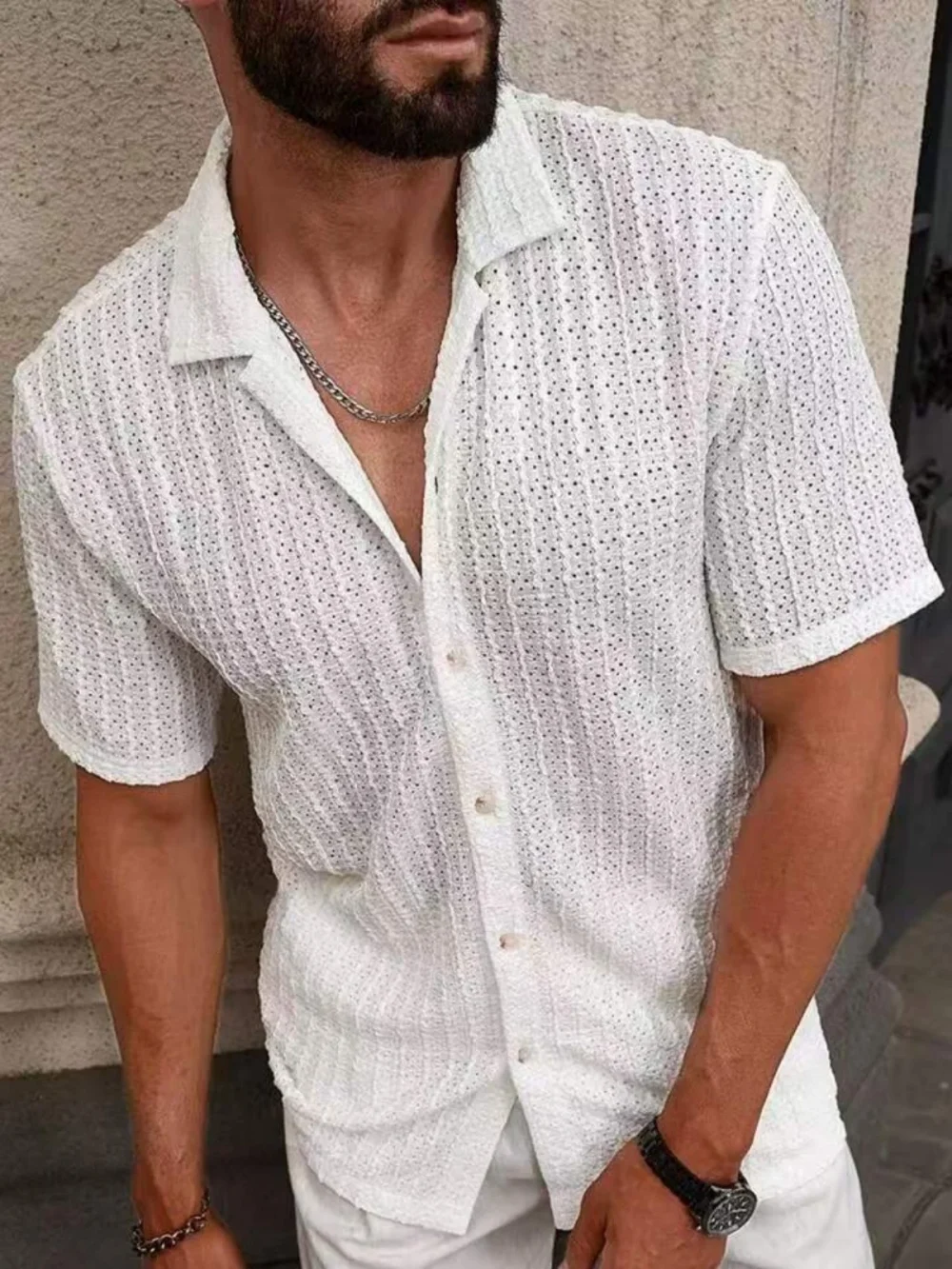 Summer's new fashionable and luxurious solid-color perforated breathable men's knitted short-sleeved shirt 1