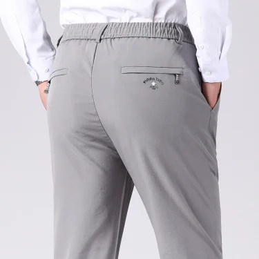 Male Elastic Waist Pants Stretch Casual Pants Large Size Trousers Sports Wear Running Jogger Pants 5XL 1